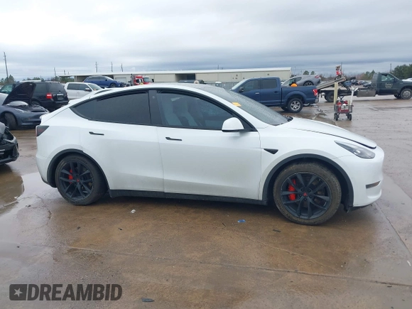 2022 Tesla Model Y Performance with VIN 7SAYGDEF1NF456829, listed as a IAAI auction lot 41448425 with 41,380 mi miles and . Bid and sale history available at DreamBid. Image 12.