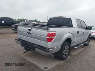 2013 Ford F-150 XL with VIN 1FTFW1CT0DKE03085, listed as a IAAI auction lot 42101522 with 266,770 mi miles and . Bid and sale history available at carsss.com. Image 4.