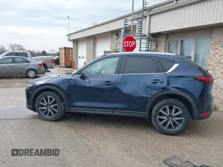 2018 Mazda CX-5 Grand Touring with VIN JM3KFADM1J1439544, listed as a IAAI auction lot 41891134 with 54,132 mi miles and . Bid and sale history available at DreamBid. Image 14.