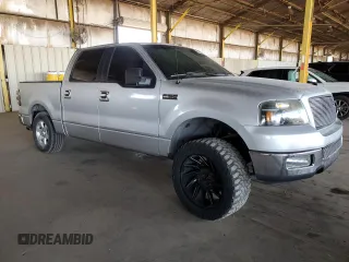 2005 Ford F-150 XLT with VIN 1FTPW12505KF07827, listed as a Copart auction lot 62026695 with Not provided miles and Salvage title. Bid and sale history available at DreamBid. Image 4.