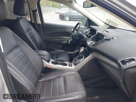 2013 Ford Escape SEL with VIN 1FMCU0H97DUD95194, listed as a IAAI auction lot 42052786 with 145,616 mi miles. Bid and sale history available at carsss.com. Image 5.