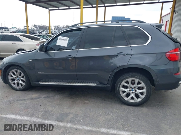 2013 BMW X5 xDrive35i z VIN 5UXZV4C57D0E04976, wystawiony jako IAAI lot #42111435 z przebiegiem 160 226 mil mil oraz . Historia ofert i sprzedaży dostępna na DreamBid. Obrazek 13.