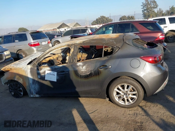 2015 Mazda 3 i Touring with VIN 3MZBM1L73FM145693, listed as a IAAI auction lot 41236304 with Not Provided miles and . Bid and sale history available at carsss.com. Image 13.