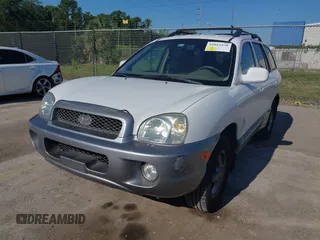 2004 Hyundai Santa Fe GLS with VIN KM8SC73D74U675555, listed as a IAAI auction lot 42021978 with 198,778 mi miles. Bid and sale history available at carsss.com. Image 2.