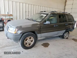 2000 Jeep Grand Cherokee Laredo с VIN 1J4GW48N7YC216355, выставлен на аукционе Copart как лот 64495745 с пробегом 247 921 миль миль и Списание • Salvage title. История ставок и продаж доступна на DreamBid. Изображение 1.