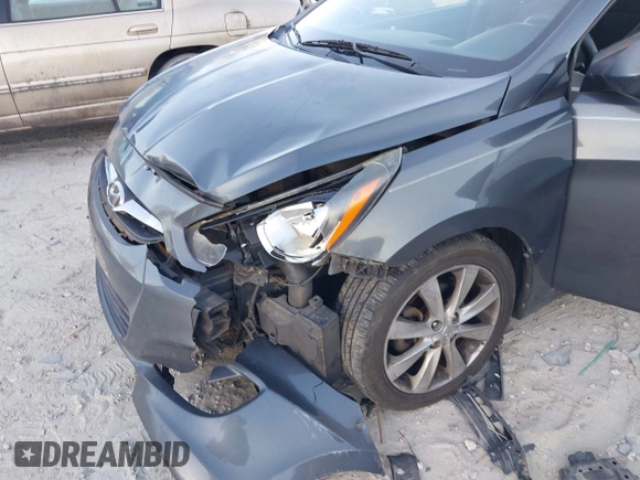 2012 Hyundai Accent SE with VIN KMHCU5AE6CU024465, listed as a IAAI auction lot 41591162 with 168,574 mi miles. Bid and sale history available at carsss.com. Image 6.