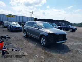2013 Audi Q7 Premium Plus with VIN WA1LGAFE5DD005771, listed as a IAAI auction lot 42706541 with 122,242 mi miles and . Bid and sale history available at DreamBid. Image 1.