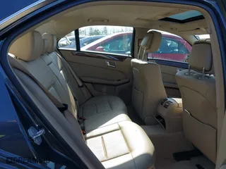 2013 Mercedes-Benz E-Class E 350 Luxury with VIN WDDHF8JB0DA707640, listed as a IAAI auction lot 41916454 with 104,469 mi miles. Bid and sale history available at carsss.com. Image 8.