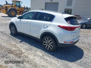 2017 Kia Sportage EX with VIN KNDPNCACXH7079500, listed as a IAAI auction lot 42051156 with 100,928 mi miles and . Bid and sale history available at DreamBid. Image 3.