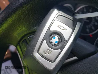 2013 BMW 3 Series 328i with VIN WBA3C1C5XDF437585, listed as a IAAI auction lot 42025388 with 101,963 mi miles. Bid and sale history available at carsss.com. Image 11.