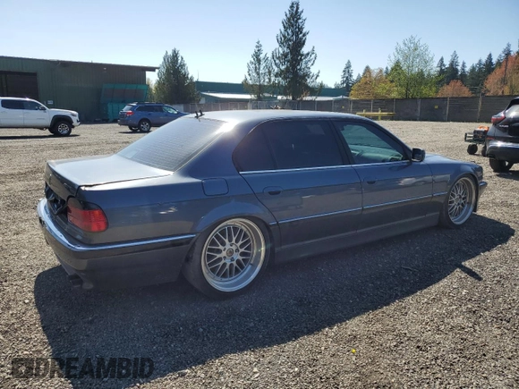2001 BMW 7 Series 740iL with VIN WBAGH83401DP20569, listed as a Copart auction lot 52725335 with 152,575 mi miles and Salvage Title. Bid and sale history available at carsss.com. Image 3.