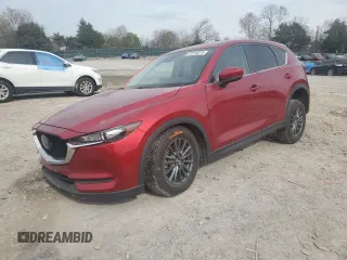 2021 Mazda CX-5 Touring with VIN JM3KFACM7M0334633, listed as a Copart auction lot 51618875 with 70,558 mi miles and Salvage Title. Bid and sale history available at DreamBid. Image 1.