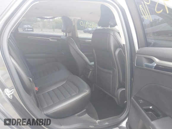 2016 Ford Fusion SE with VIN 3FA6P0T99GR276791, listed as a IAAI auction lot 42445910 with 117,355 mi miles and . Bid and sale history available at DreamBid. Image 8.