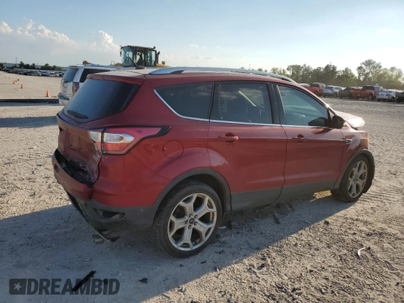 2017 Ford Escape Titanium with VIN 1FMCU0J97HUD52930, listed as a Copart auction lot 71851014 with 101,467 mi miles and Salvage Title. Bid and sale history available at carsss.com. Image 3.