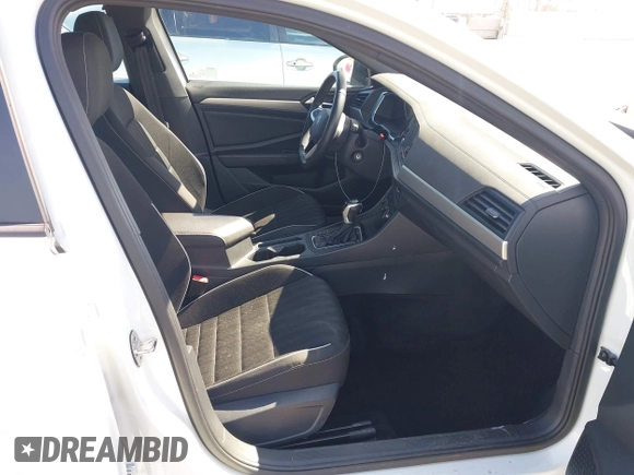 2023 Volkswagen Jetta Sport with VIN 3VWBM7BU5PM051794, listed as a IAAI auction lot 42023152 with 31,826 mi miles and . Bid and sale history available at DreamBid. Image 5.