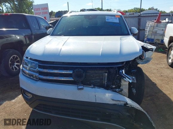 2018 Volkswagen Atlas SEL z VIN 1V2MR2CA3JC536009, wystawiony jako IAAI lot #40205798 z przebiegiem 125 945 mil mil oraz . Historia ofert i sprzedaży dostępna na DreamBid. Obrazek 6.