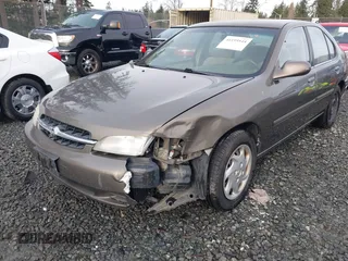 1999 Nissan Altima XE with VIN 1N4DL01D1XC210017, listed as a IAAI auction lot 41199544 with 297,917 mi miles. Bid and sale history available at carsss.com. Image 6.