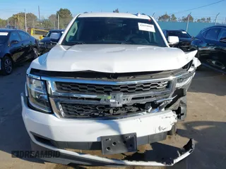 2015 Chevrolet Suburban LT with VIN 1GNSCJKC2FR680413, listed as a IAAI auction lot 41634666 with 127,175 mi miles and . Bid and sale history available at DreamBid. Image 12.