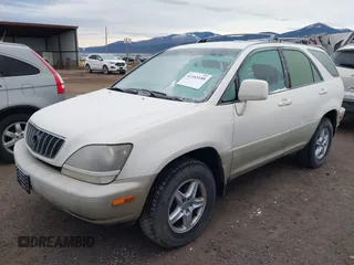 1999 Lexus RX 300 Luxury SUV with VIN JT6HF10U3X0033392, listed as a IAAI auction lot 41165188 with 233,343 mi miles. Bid and sale history available at carsss.com. Image 2.