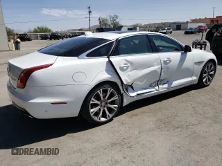 2019 Jaguar XJ Portfolio with VIN SAJWA2G72K8W21087, listed as a Copart auction lot 66017344 with 22,671 mi miles and Salvage Title. Bid and sale history available at DreamBid. Image 3.