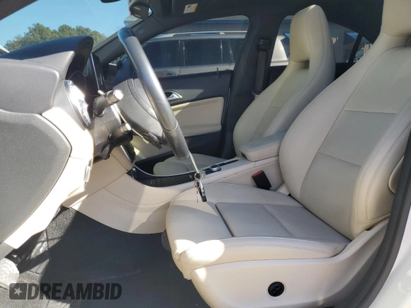 2016 Mercedes-Benz CLA 250 with VIN WDDSJ4EBXGN293738, listed as a Copart auction lot 89341895 with 57,279 mi miles and Salvage Title. Bid and sale history available at DreamBid. Image 7.