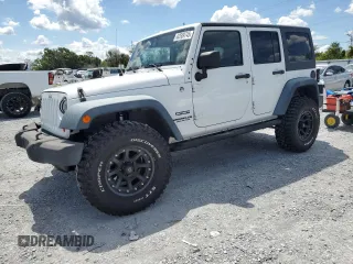 2012 Jeep Wrangler Unlimited Sport with VIN 1C4BJWDG3CL229078, listed as a Copart auction lot 62509745 with 138,219 mi miles and Clean title. Bid and sale history available at DreamBid. Image 1.