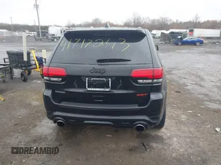 2018 Jeep Grand Cherokee SRT z VIN 1C4RJFDJ2JC391503, wystawiony jako IAAI lot #41717243 z przebiegiem 78 157 mil mil oraz . Historia ofert i sprzedaży dostępna na DreamBid. Obrazek 16.