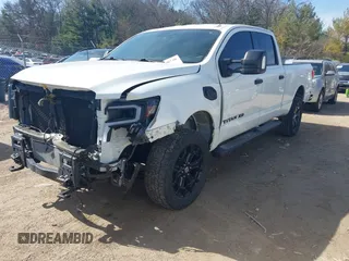2018 Nissan Titan XD SV with VIN 1N6BA1F40JN523851, listed as a IAAI auction lot 41800730 with 104,527 mi miles. Bid and sale history available at carsss.com. Image 20.