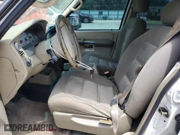2003 Ford Explorer Sport Trac XLS with VIN 1FMZU67E43UB37127, listed as a Copart auction lot 58377075 with 219,033 mi miles and Salvage title. Bid and sale history available at DreamBid. Image 7.