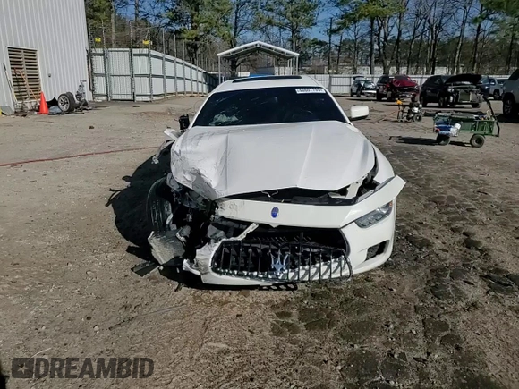 2016 Maserati Ghibli z VIN ZAM57XSAXG1167773, wystawiony jako Copart lot #46607705 z przebiegiem 62 421 mil mil oraz Szkoda całkowita • Salvage title. Historia ofert i sprzedaży dostępna na DreamBid. Obrazek 13.