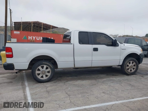 2007 Ford F-150 STX with VIN 1FTRX12W57FA45095, listed as a IAAI auction lot 41880108 with 168,216 mi miles and . Bid and sale history available at DreamBid. Image 13.