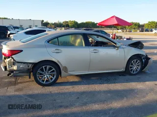 2016 Lexus ES 300h z VIN JTHBW1GG4G2106710, wystawiony jako IAAI lot #41684479 z przebiegiem 144 559 mil mil oraz . Historia ofert i sprzedaży dostępna na DreamBid. Obrazek 8.