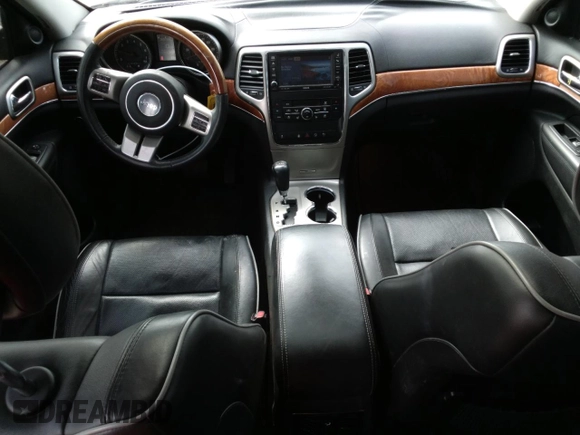 2013 Jeep Grand Cherokee Overland with VIN 1C4RJFCG5DC638927, listed as a Copart auction lot 52752615 with 117,494 mi miles and Salvage Title. Bid and sale history available at carsss.com. Image 8.