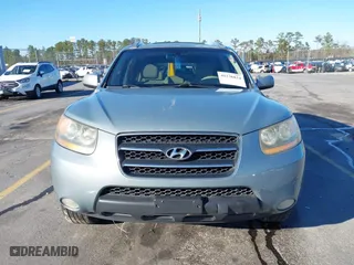 2009 Hyundai Santa Fe SE with VIN 5NMSH13E09H259020, listed as a IAAI auction lot 41236834 with 180,776 mi miles. Bid and sale history available at carsss.com. Image 12.