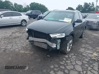 2017 Audi Q3 Premium Plus with VIN WA1JCCFS9HR010792, listed as a IAAI auction lot 42370894 with 99,034 mi miles and . Bid and sale history available at DreamBid. Image 2.