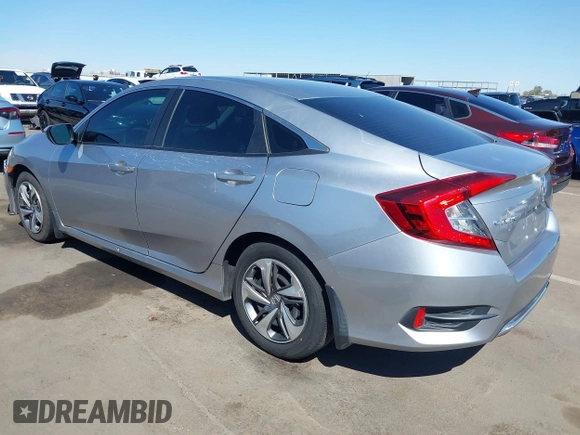 2021 Honda Civic Sedan LX with VIN 2HGFC2F69MH514408, listed as a IAAI auction lot 41845295 with 44,126 mi miles. Bid and sale history available at carsss.com. Image 3.