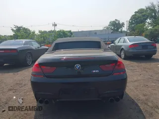 2014 BMW M6 z VIN WBSLZ9C5XEDZ78402, wystawiony jako IAAI lot #42399055 z przebiegiem 127 803 mil mil oraz . Historia ofert i sprzedaży dostępna na DreamBid. Obrazek 16.