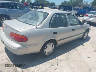2001 Chevrolet Prizm with VIN 1Y1SK52861Z421412, listed as a IAAI auction lot 42535992 with 72,632 mi miles and . Bid and sale history available at DreamBid. Image 4.