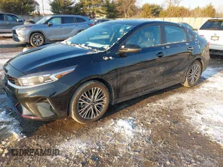 2023 Kia Forte GT-Line z VIN 3KPF54AD2PE534865, wystawiony jako IAAI lot #41417713 z przebiegiem 24 074 mil mil oraz . Historia ofert i sprzedaży dostępna na DreamBid. Obrazek 2.