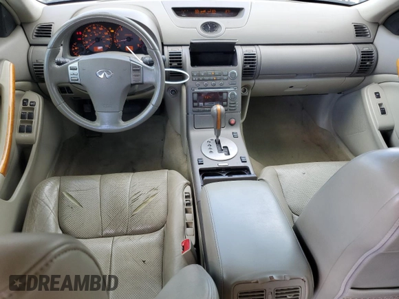 2004 Infiniti G35 w/Leather with VIN JNKCV51F54M711902, listed as a Copart auction lot 70869704 with 151,520 mi miles and Salvage Title. Bid and sale history available at DreamBid. Image 8.