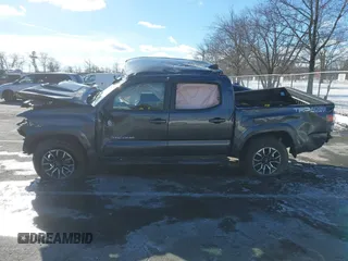 2023 Toyota Tacoma SR with VIN 3TMCZ5AN9PM574534, listed as a IAAI auction lot 41167910 with 27,375 mi miles and . Bid and sale history available at DreamBid. Image 13.
