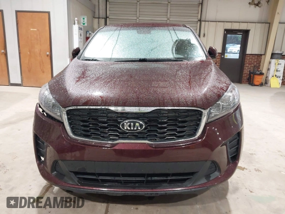 2019 Kia Sorento L with VIN 5XYPG4A34KG548624, listed as a IAAI auction lot 42020831 with 124,226 mi miles. Bid and sale history available at carsss.com. Image 12.