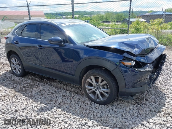 2021 Mazda CX-30 Premium z VIN 3MVDMBDL7MM236474, wystawiony jako IAAI lot #42284515 z przebiegiem 58 565 mil mil oraz . Historia ofert i sprzedaży dostępna na DreamBid. Obrazek 1.