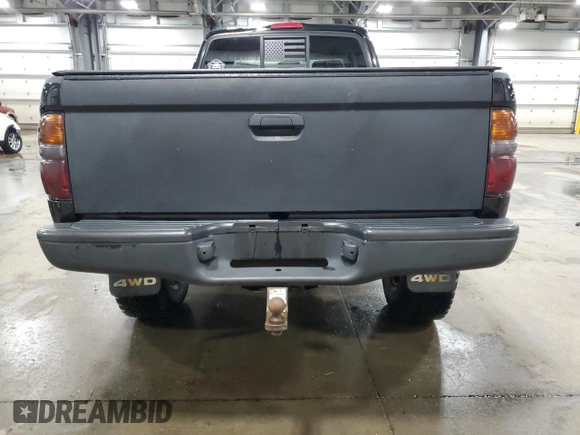 2004 Toyota Tacoma with VIN 5TEWN72N14Z424211, listed as a Copart auction lot 51815615 with 203,415 mi miles and Salvage Title. Bid and sale history available at DreamBid. Image 6.