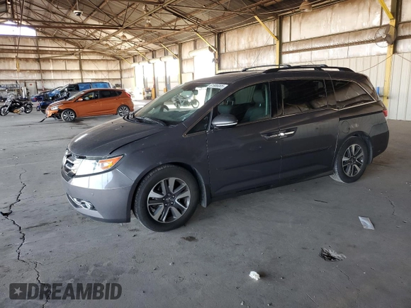 2014 Honda Odyssey Touring with VIN 5FNRL5H99EB111525, listed as a Copart auction lot 61986005 with 137,905 mi miles and Salvage title. Bid and sale history available at DreamBid. Image 1.