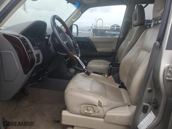 2002 Mitsubishi Montero LTD with VIN JA4MW51R12J036815, listed as a Copart auction lot 80536184 with 180401 miles and Salvage Title. Bid and sale history available at carsss.com. Image 7.