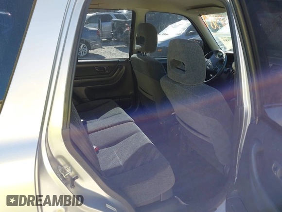 1999 Honda CR-V LX with VIN JHLRD1841XC027566, listed as a IAAI auction lot 41838889 with 213,139 mi miles. Bid and sale history available at carsss.com. Image 8.