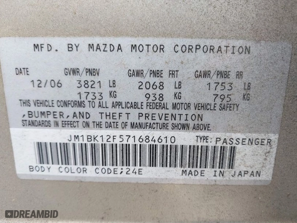 2007 Mazda Mazda3 i Sport with VIN JM1BK12F571684610, listed as a IAAI auction lot 41869981 with 203,816 mi miles. Bid and sale history available at carsss.com. Image 9.