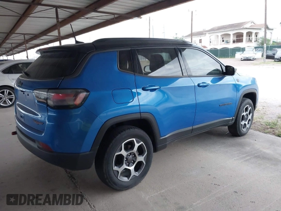 2022 Jeep Compass Trailhawk z VIN 3C4NJDDB6NT162831, wystawiony jako IAAI lot #41950418 z przebiegiem 34 762 mil mil oraz . Historia ofert i sprzedaży dostępna na DreamBid. Obrazek 4.