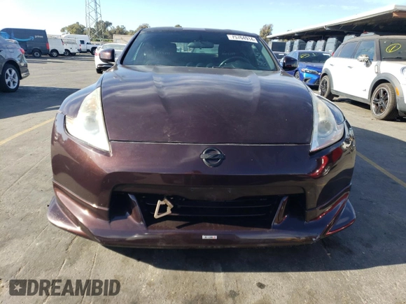 2010 Nissan 370Z Touring with VIN JN1AZ4EH3AM505754, listed as a Copart auction lot 75764914 with 66,299 mi miles and Salvage Title. Bid and sale history available at carsss.com. Image 5.